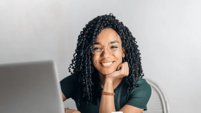 Successful global messaging, photo of woman smiling at the camera