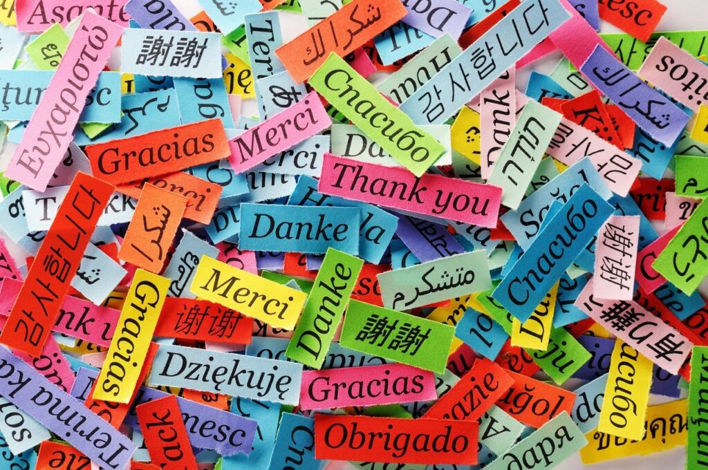 How to team lead across continents and time zones photo of the word thank you in lots of different languages